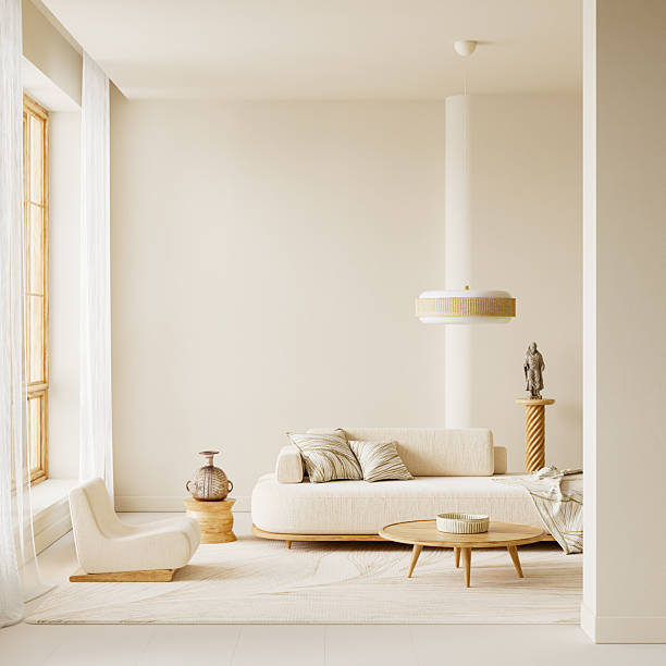 istock Minimal warm interior with wide empty wall, soft daylight and beige decor creating natural text space for clean visual balance. 3D illustration. 2248220726