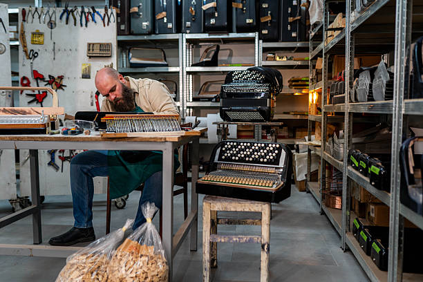 istock Craftsman makes accordion 2248224019