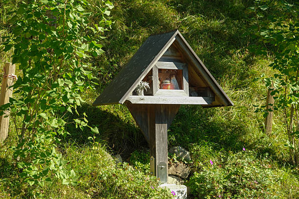 Traditional Wooden Wayside Shrine in Austrian Alps.