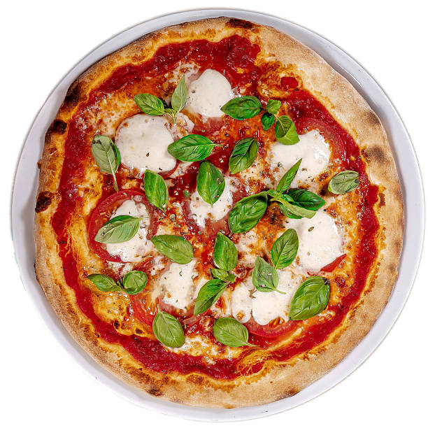 istock Caprese pizza tomatoes, mozzarella and basil on light wooden table 2248229787