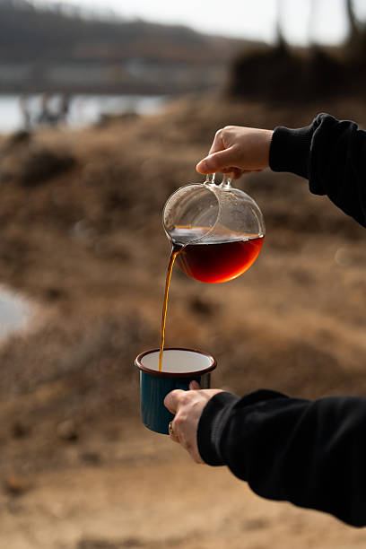 istock Brewing coffee by the lake in nature 2248232692