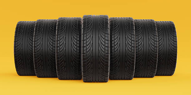 istock Automotive Equipment Concept. Set Of Black Car Tires With Tread Pattern. 3d Rendering 2248233313