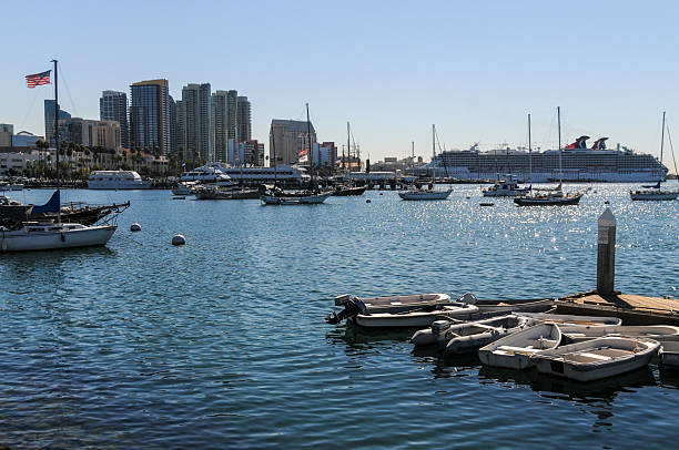 San Diego, United States - November 12, 2010. Wide Angle shot showing the San Diego Waterfront, with many boats, yachts and cruise ships anchored in the harbour.