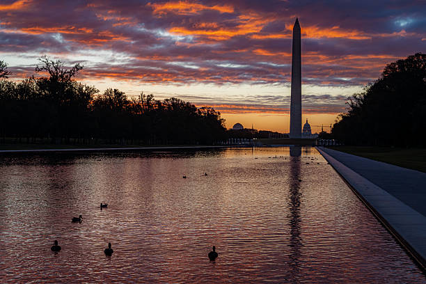 istock Washington Monument reflects fiery sunset over reflecting pool 2248239318