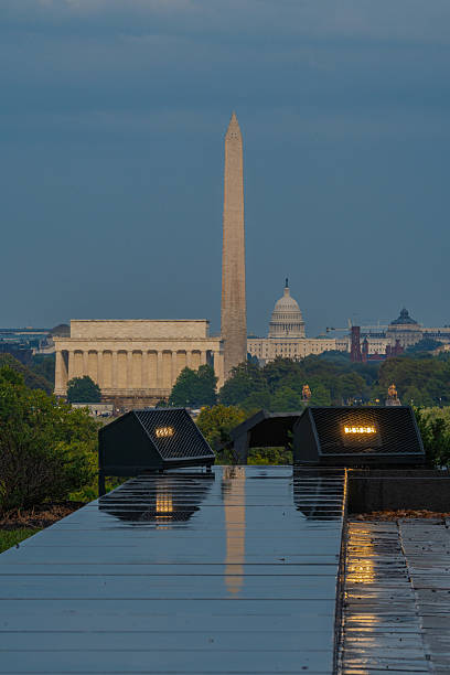 istock Washington Monument and Capitol Building reflected on wet surface. 2248239479