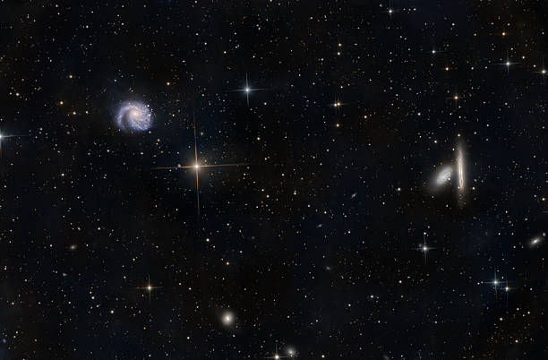 Spiral galaxies and an edge on galaxy in the constellation Coma Berenices