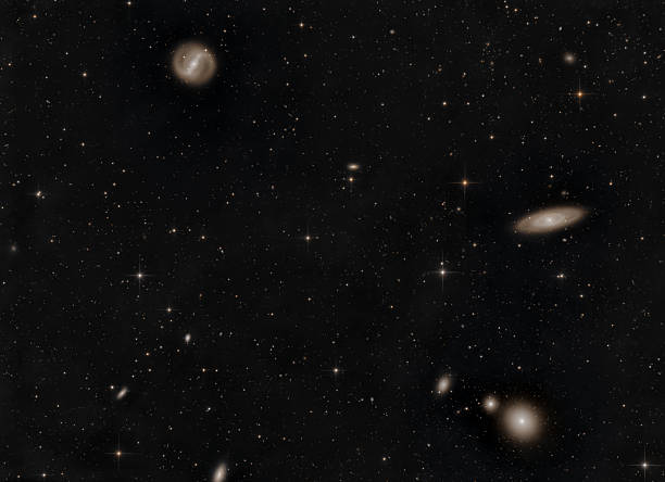 NGC4314 and NGC4274 are barred spiral galaxies in the constellation Coma Berenices