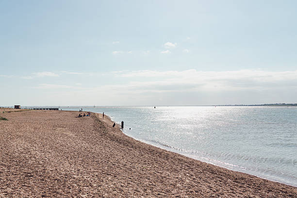 Deck chairs on an English Beach overlooking the english Channel