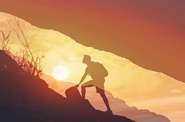 istock Man hiking at sunrise. 2248253756