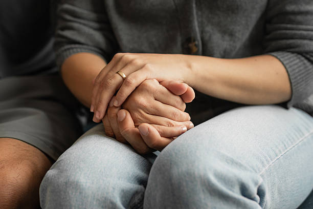 istock Close-up of couple’s hands showing care, unity, and emotional support 2248254632