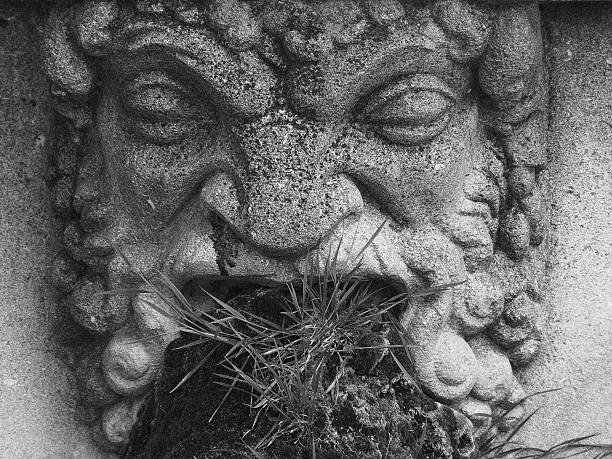 Stone face, fountain with three masks, Lourmarin, Vaucluse