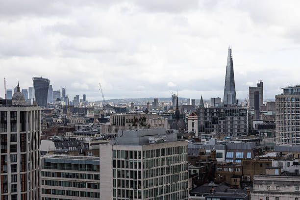 Experience the majestic London skyline, showcasing The Shard and other architectural marvels under a classic British sky. London, UK, 21 October 2023