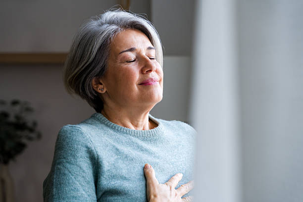istock Mature woman finding peace and practicing mindful breathing 2248259688