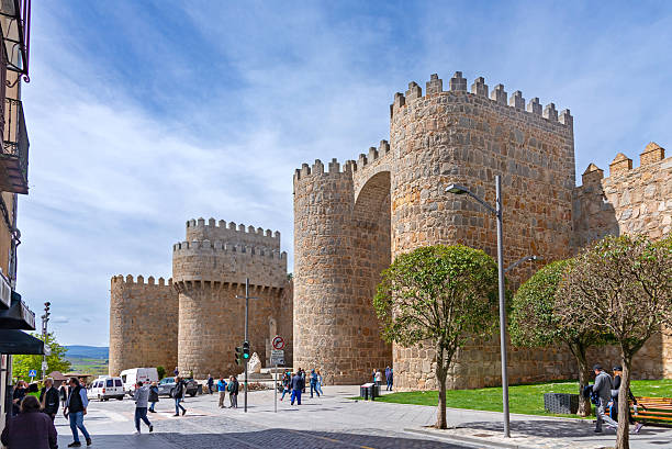 istock Medieval Stone Towers Overlook Modern Streetscape 2248264869