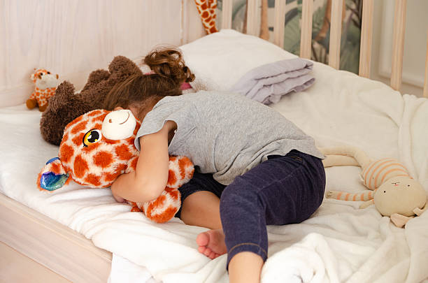 istock A little girl playing at home. 2248265754