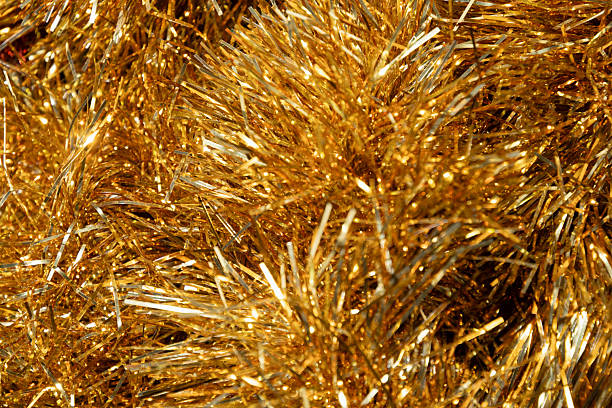 istock Golden tinsel Christmas tree bokeh background 2248267582