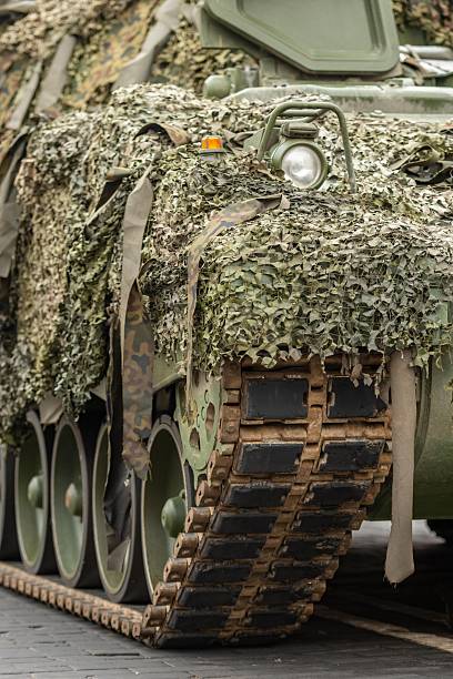 istock Armored tank moving on the road 2248267911