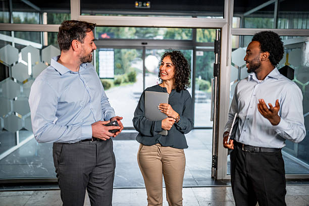 istock Diverse business professionals having informal discussion in modern office 2248268053