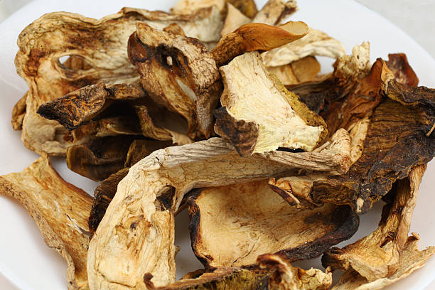 istock Dried mushrooms ready for cooking or seasoning dishes 2248268884
