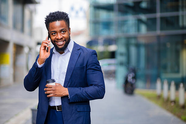 istock Black businessman on coffee break call 2248269693