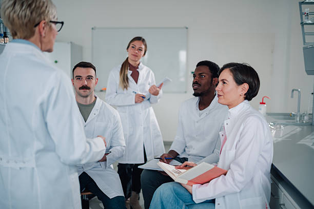 istock Diverse group of scientists listening during laboratory meeting 2248270021