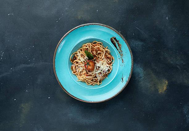 istock Classic Spaghetti Bolognese with Parmesan Cheese and Basil 2248272237