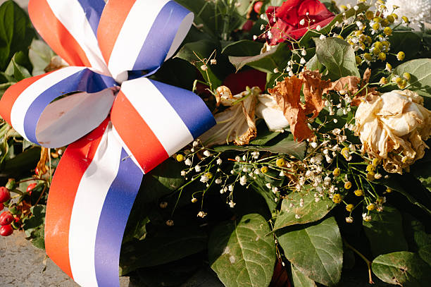 Flower bouquet with a red, white and blue ribbon