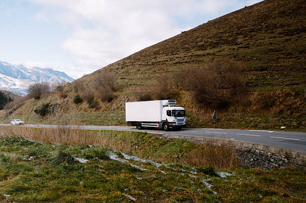 istock Truck on a mountain road 2248274548