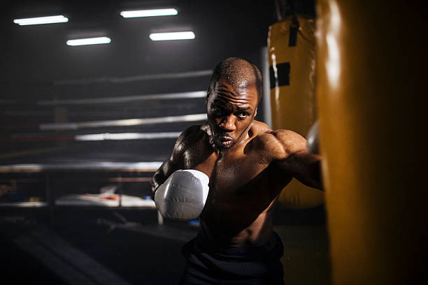 istock Intense boxer training in the boxing gym 2248280918