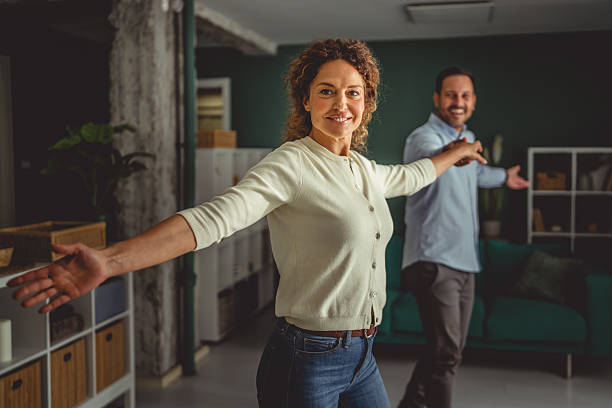 istock Couple dancing joyful together at home 2248281683