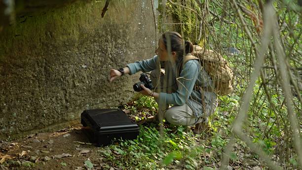 istock Retro Tech Coming Back. Archaeologist Uses Old Film Camera 2248286866