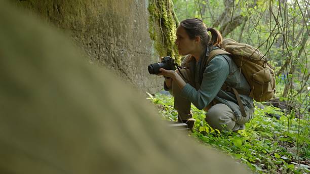 istock Retro Tech Coming Back. Archaeologist Uses Old Film Camera 2248286871
