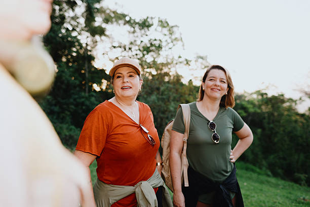 Women hiking together at dusk