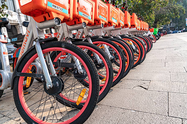 Milan, Italy  - October 12, 2025:  A row of shared bicycles was parked in square of Milano Centrale railway station, Milan, Milan, Italy .