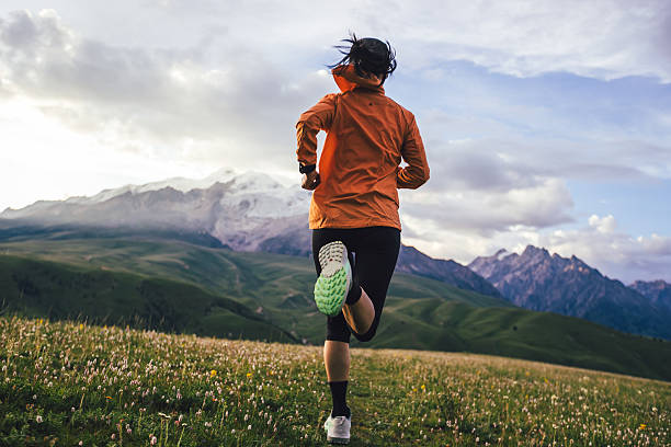 istock Trail runner running on the high altitude grassland mountain top trail 2248289236