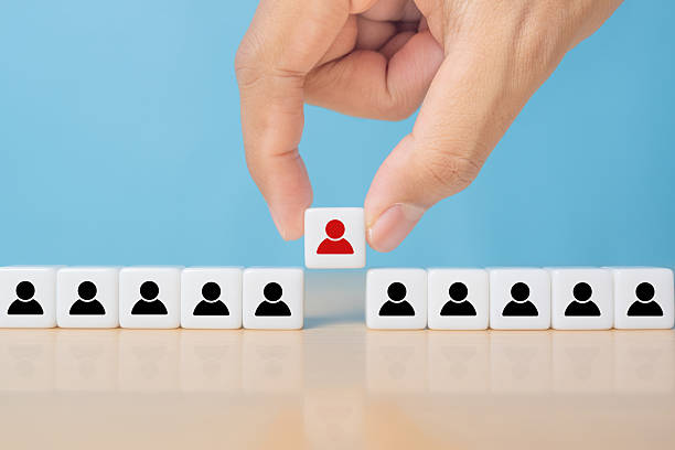 istock Person icon on dice with hand picked different from the crowd 2248295660