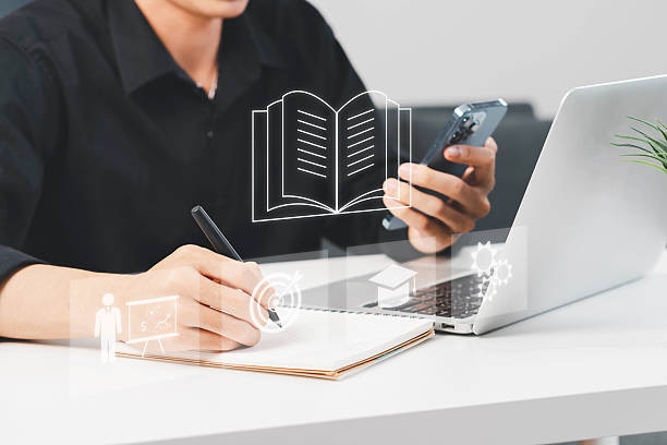 istock e-learning on a laptop. learning icon, library on the internet website. concept of lesson learning e-book training digital online. course education in webinar technology 2248300914