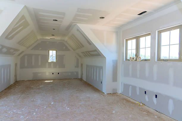 istock Empty room with unfinished drywall ready for interior design decoration in new construction home 2248303186