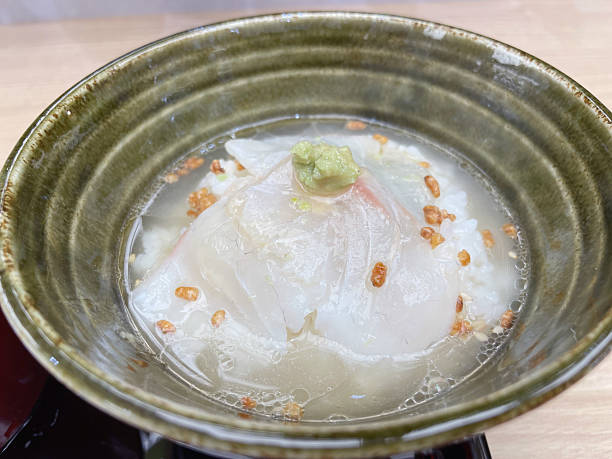 istock Sea bream on rice with green tea 2248303290
