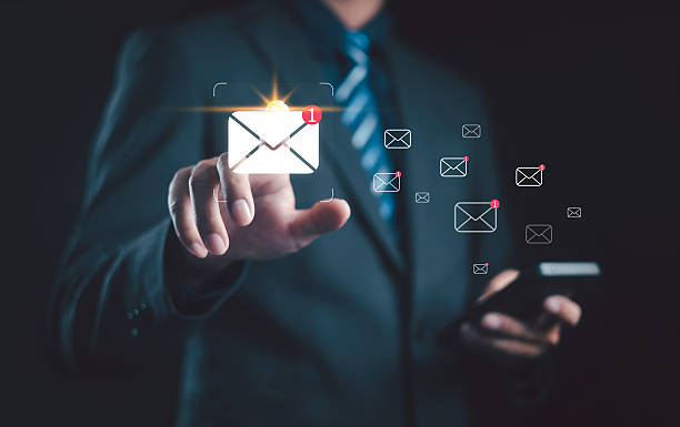istock Businessman touching digital email icon with new message notification, representing online communication, email marketing, digital network, and business connection in modern technology concept. 2248304290