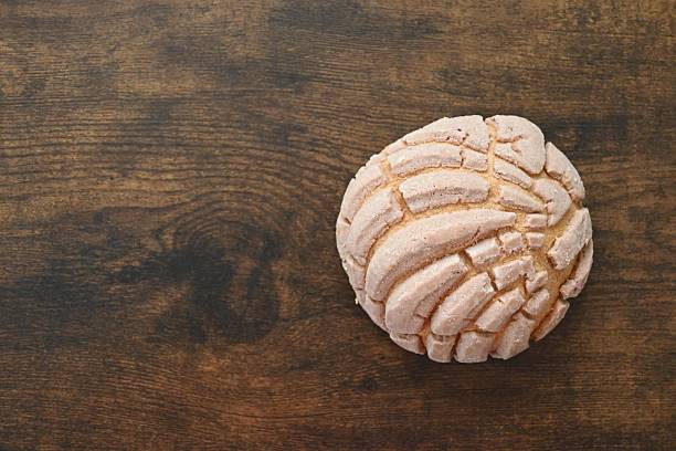 Macro takes a picture of a melon bread.
