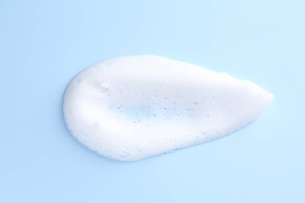 istock Sample of fluffy foam on light blue background, top view 2248311665