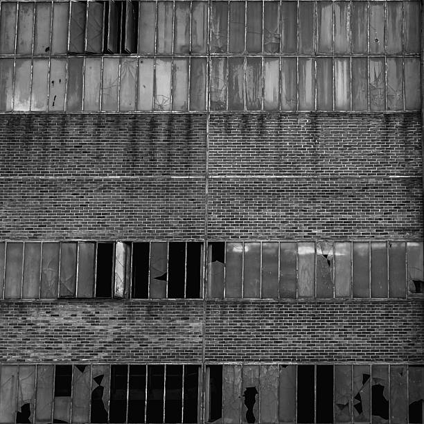 istock This wall, trapped in a contrasting black and white, is an infinite pattern of bricks and glass – a monumental matrix of the past. 2248312611