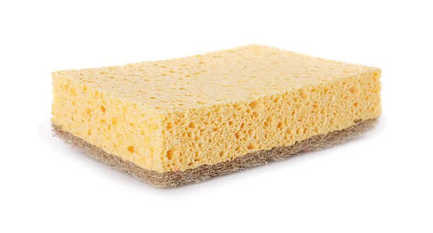 istock Cleaning supply. One sponge isolated on white 2248314861