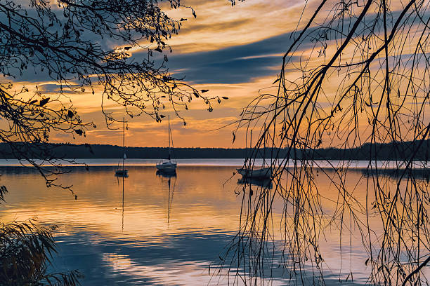 Yachts on the lake at sunset.