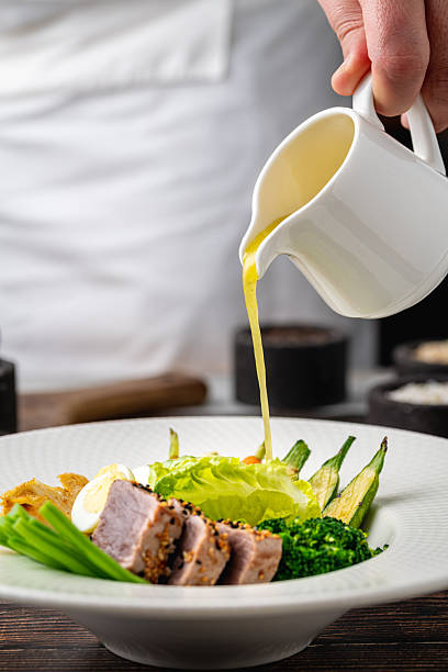 istock Fresh tuna salad with vegetables, eggs, and green greens 2248315592