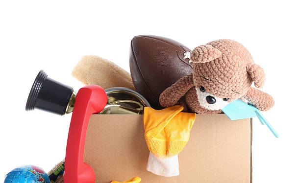 istock Box of unwanted stuff isolated on white 2248318736