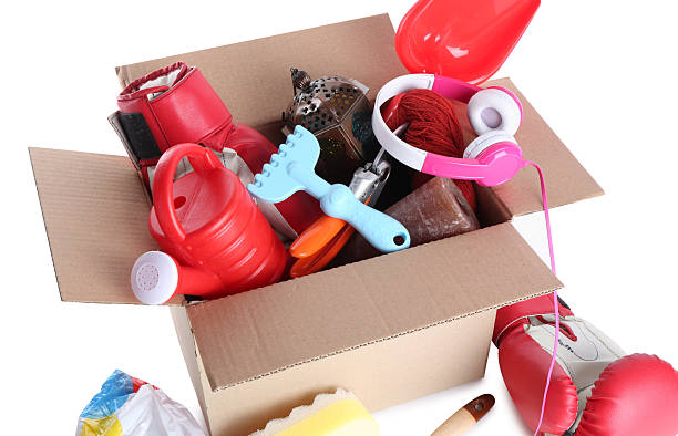 istock Box of unwanted stuff isolated on white 2248318749