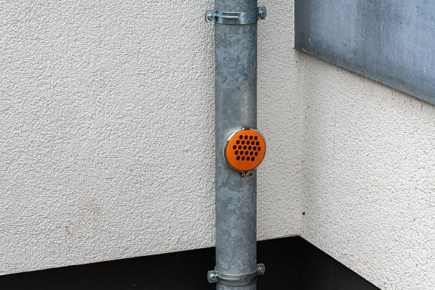 istock Metal storm drain pipe with orange plastic cap for cleaning 2248319295