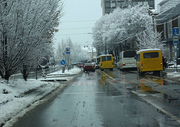 City, city streets covered in snow, first snow